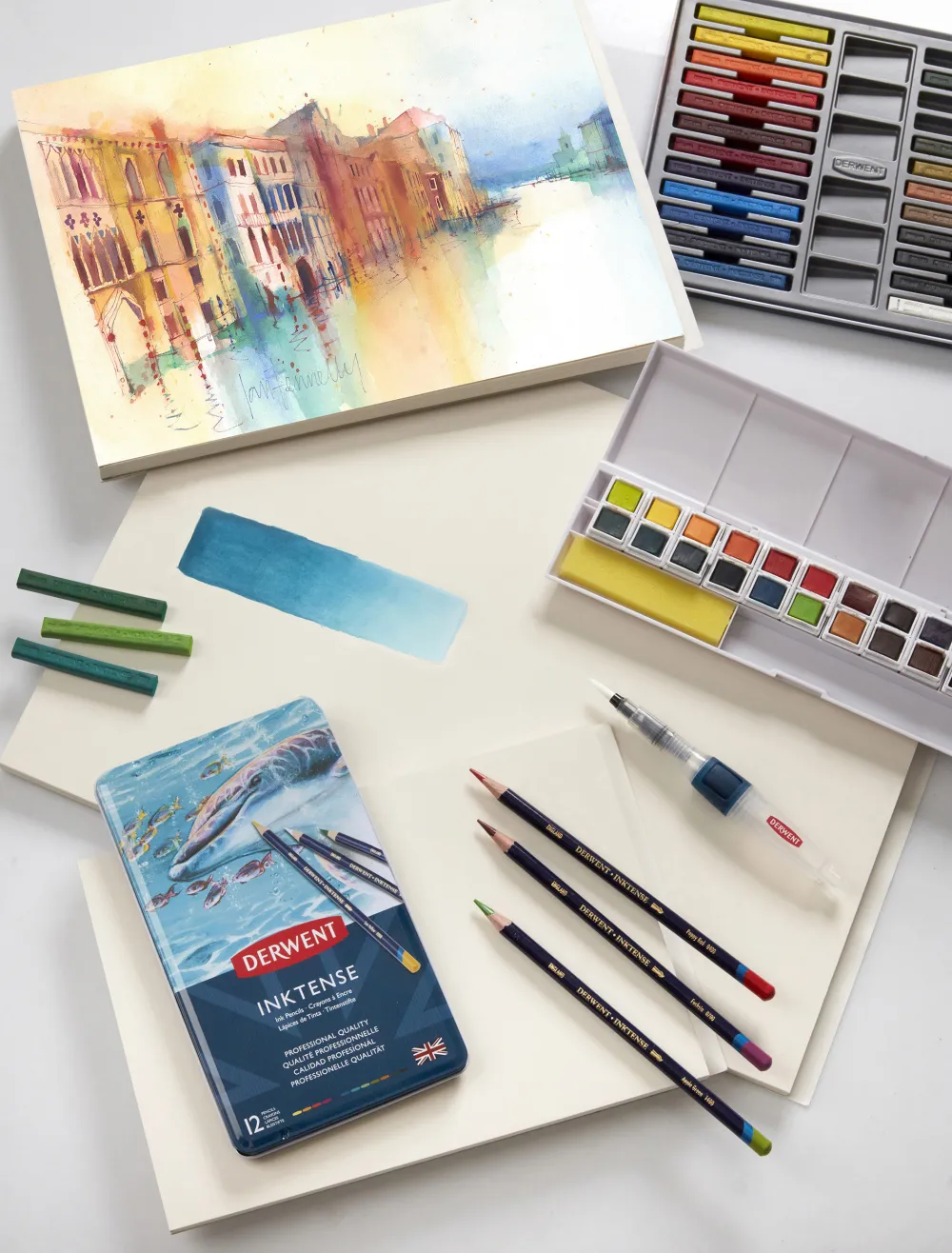 Derwent Zestaw kredek Inktense w metalowej kasecie - - 12 kolorów > Kredki